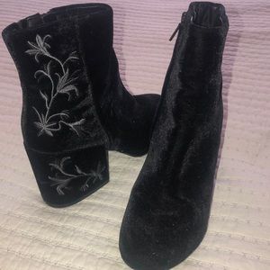 Black suede booties with cute details